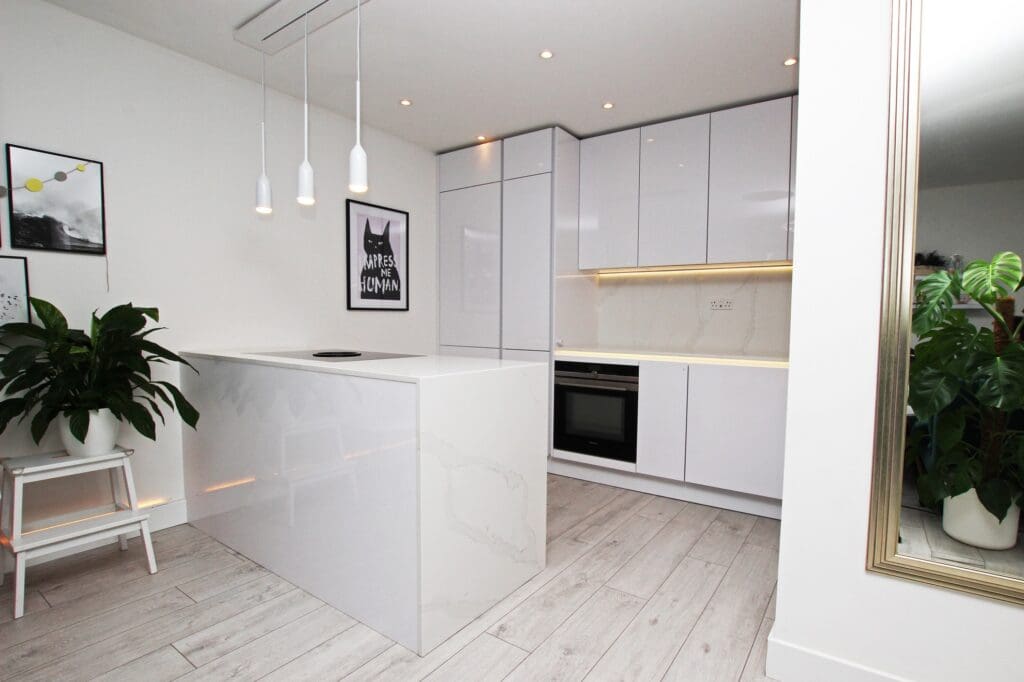 1. Small White Kitchen With Peninsula | MHK Kitchen Experts
